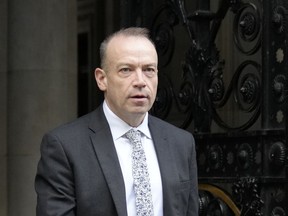 Chris Heaton-Harris, the Secretary of State for Northern Ireland arrives for a Cabinet meeting, the first held by the new British Prime Minister Rishi Sunak, in London, Wednesday, Oct. 26, 2022. Sunak was elected by the ruling Conservative party to replace Liz Truss who resigned.