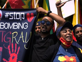 Members of the Tigrayan community protest against the conflict between Ethiopia and Tigray rebels in Ethiopia's Tigray region, outside the the United Arab Emirates embassy in Pretoria, South Africa, Wednesday, Oct. 12, 2022. Tigray rebels and Ethiopia's federal government were scheduled to participate in African Union-brokered peace talks in South Africa on Oct. 8 but they were delayed while logistical issues and security arrangements are being ironed out.