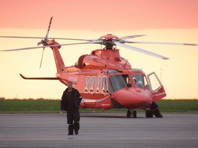 An Ornge air ambulance helicopter is secured on the tarmac in Kingston, Ont. on Monday June 9, 2014.