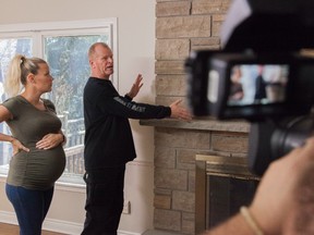Mike Holmes and Sherry discuss a homeowner's wood-burning fireplace from Holmes and Holmes, Season 2.