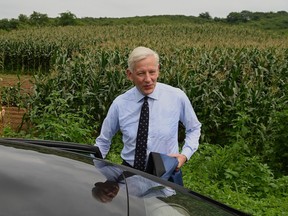 Former Canadian Ambassador Dominic Barton gets into a car near the Dandong city detention center after attending the guilty verdict hearing on Canadian businessman Michael Spavor on spying charges in the border city of Dandong, in China's northeast Liaoning province on August 11, 2021. (Photo by Noel Celis / AFP)
