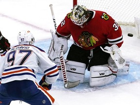 Edmonton Oilers centre Connor McDavid scores past Chicago Blackhawks goaltender Alex Stalock during&ampnbsp;the third period of an NHL hockey game in Chicago, Thursday, Oct. 27, 2022. McDavid, New Jersey left-wing Jesper Bratt and Minnesota goaltender Marc-Andre Fleury have been named the NHL's three stars of the week.