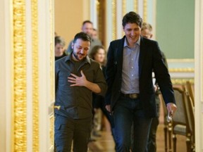 Canada's Prime Minister Justin Trudeau walks with Ukraine's President Volodymyr Zelenskyy on May 8, 2022.