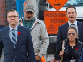Lawyer Keith Wilson and Freedom Convoy organizers Chris Barber, Tamara Lich, and Tom Marazzo arrive at the Public Order Emergency Commission in Ottawa, Ontario, Canada November 2, 2022. REUTERS/Patrick Doyle
