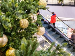 Deloitte Canada predicts average household holiday spending will fall 17 per cent this season.   GETTY IMAGES