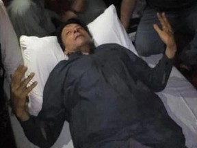 Former PM Imran Khan injured in firing. His party calls it an "assassination attempt."