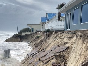 A view of damage to the backyard of a property by storm tides, before the expected arrival of Tropical Storm Nicole, in Volusia County, Florida, U.S. November 9, 2022.