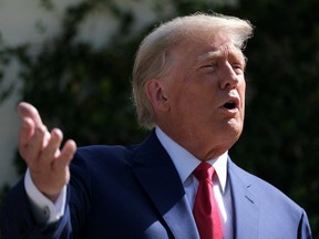 Former U.S. President Donald Trump speaks outside a polling station during midterm election in Palm Beach, Florida, U.S. November 8, 2022.  REUTERS/Ricardo Arduengo/File Photo