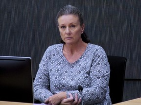 Kathleen Folbigg appears via video link during a convictions inquiry at the NSW Coroners Court in Sydney, Australia on May 1, 2019. An Australian inquiry began investigating on Monday, Nov. 14, 2022 whether the woman convicted of smothering her four children to death over a decade ago might be innocent.