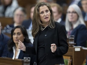 Deputy Prime Minister and Finance Minister Chrystia Freeland rises during question period, in Ottawa, Monday, Sept. 26, 2022. Finance Minister Chrystia Freeland will table her mid-year budget update in the House of Commons today focused heavily on driving investment to Canada's clean energy industries in response to new American tax incentives signed into law last summer.