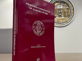 A copy of the proposed constitution of Alabama of 2022 is seen at the statehouse in Montgomery, Ala., on Tuesday, Nov. 1, 2022. Alabama voters on Nov. 8 will vote whether to ratify a recompiled Alabama Constitution that strips racist language and deleted repealed and redundant sections. The state's governing document will remain the longest in the United States at over 300,000 words.