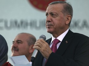 Turkish President Recep Tayyip Erdogan addresses at an inauguration ceremony of new government buildings in Ankara, Turkey, Wednesday, Oct. 19, 2022. T