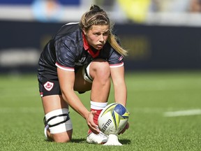 Canada's Sophie De Goede prepares to take a shot at goal during the women's rugby World Cup semifinal between Canada and England at Eden Park in Auckland, New Zealand, Saturday, Nov.5, 2022.
