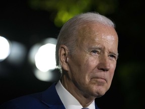President Joe Biden listens to a question as he speaks during a media availability on the sidelines of the G20 summit meeting, Monday, Nov. 14, 2022, in Bali, Indonesia.