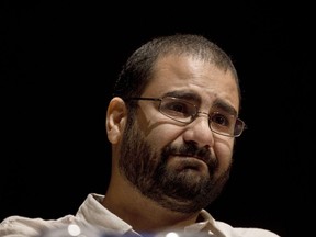FILE - Egypt's leading pro-democracy activist Alaa Abdel-Fattah speaks during a conference at the American University in Cairo, Egypt, Sept. 22, 2014. The family of imprisoned activist Abdel-Fattah said that he will go on a full hunger strike starting Tuesday, Nov. 2, 2022, and that he will stop drinking water on the first day of the country hosting the global climate summit COP27 next week.
