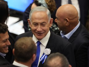 Israel's Likud Party leader Benjamin Netanyahu arrives during the swearing-in ceremony for Israeli lawmakers at the Knesset, Israel's parliament, in Jerusalem, Tuesday, Nov. 15, 2022. Israeli lawmakers were sworn in at the Knesset, on Tuesday, following national elections earlier this month.