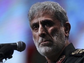 FILE - General Esmail Ghaani, head of Iran's expeditionary Quds Force, speaks in a ceremony in Tehran, Iran, Thursday, April 14, 2022. Multiple Iraqi and Kurdish officials say Ghaani, a senior Iranian military official has threatened Iraq with an unprecedented ground military operation if Baghdad does not disarm Iranian Kurdish opposition groups and fortify its shared borders with Iran.