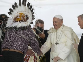Pope Francis meets members of indigenous communities, including First Nations, Metis and Inuit, at Our Lady of Seven Sorrows Catholic Church in Maskwacis, near Edmonton, Canada, Monday, July 25, 2022. Pope Francis begins a "penitential" visit to Canada to beg forgiveness from survivors of the country's residential schools, where Catholic missionaries contributed to the "cultural genocide" of generations of Indigenous children by trying to stamp out their languages, cultures and traditions. Francis set to visit the cemetery at the former residential school in Maskwacis.