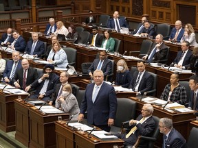 Ontario's Premier Doug Ford and members of the PC caucus attend question period at the Queens Park Legislature, in Toronto, on Monday, November 14, 2022.