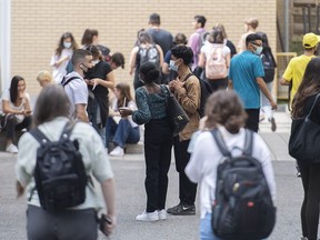 Students are shown at Dawson College in Montreal, Monday, August 23, 2021, as they return to in class learning. The Ottawa Carleton District School Board held a special meeting Tuesday night that became chaotic after disruptions from people who showed up to oppose reinstating a mask mandate in classrooms.THE CANADIAN PRESS/Graham Hughes