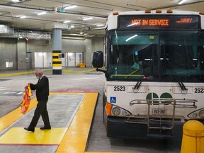 A bus driver disembarks a GO Transit bus at the new Union Station Bus Terminal in Toronto on Tuesday, Nov. 2, 2021.