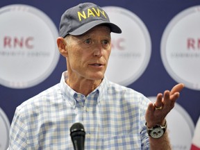 U.S. Sen. Rick Scott, R-Fla., gestures as he speaks during a Get Out To Vote rally Tuesday, Oct. 18, 2022, in Tampa, Fla.