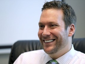 FILE - In this Sept. 30, 2019, file photo, Seminole County Tax Collector Joel Greenberg talks to the Orlando Sentinel during an interview at his office in Lake Mary, Fla. A former Florida tax collector whose arrest on sex trafficking and identity theft charges led to a probe of U.S. Rep. Matt Gaetz should not be granted a sentence that is less than federal guidelines in order to promote respect for the law and deter criminal behavior, federal prosecutors said in court papers.