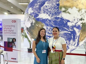 Yukon delegates Jocelyn Joe-Strack, left, research chair in Indigenous Knowledge at Yukon University and co-lead of the Yukon First Nations Climate Action Fellowship, poses with Carissa Waugh, a fellow with the Yukon First Nations Climate Action Fellowship, for a picture at COP27 in Sharm El-Sheikh, Egypt, in a Nov. 11, 2022, handout photo.