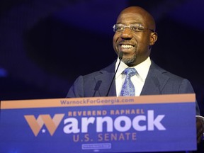 Democratic Sen. Raphael Warnock speaks during an election night watch party on Tuesday, Nov. 8, 2022, in Atlanta.