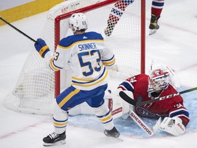 Montreal Canadiens goaltender Jake Allen looks back on his goal after being scored on by Buffalo Sabres' Jeff Skinner during second period NHL hockey action in Montreal, Tuesday, November 22, 2022.