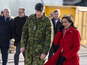 Defence Minister Anita Anand, right, walks with Gen. Wayne Eyre, chief of defence staff, as they attend an announcement in Halifax on Friday, Nov.18, 2022. Halifax has been selected to be the host of NATO's North American regional office for defence innovation.