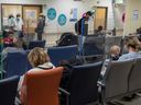 Parents and their children in the Montreal Children’s Hospital emergency waiting room.