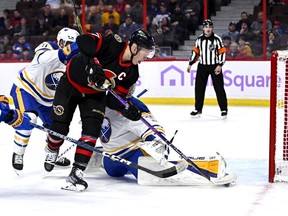 Ottawa Senators left wing Brady Tkachuk (7) watches as his shot on Buffalo Sabres goaltender Eric Comrie (31) crosses the goal line and into the net during second period NHL hockey action in Ottawa, on Wednesday, Nov. 16, 2022.