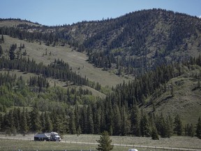 A gravel truck passes through land proposed for coal development in the eastern slopes of the Livingstone range south west of Longview, Alta., Wednesday, June 16, 2021.