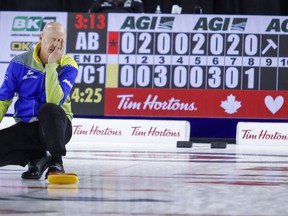 Team Alberta skip Kevin Koe reacts to a missed shot during finals action against Team Wild Card One at the Tim Hortons Brier in Lethbridge, Alta., Sunday, March 13, 2022.