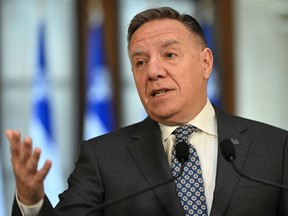 Quebec Premier François Legault speaks at a news conference prior to his government's first cabinet meeting since his party was re-elected, Wednesday, Oct. 26, 2022, at the legislature in Quebec City.