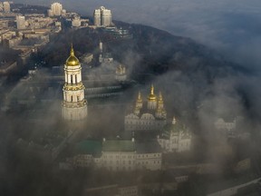 FILE - An aerial photo shows the thousand-year-old Monastery of Caves, also known as Kiev Pechersk Lavra, the holiest site of Eastern Orthodox Christians taken through morning fog during a sunrise in Kyiv, Ukraine, Saturday, Nov. 10, 2018. Ukraine's counter-intelligence service, police and the country's National Guard on Tuesday, Nov. 22, 2022 searched the Pechersk Lavra monastic complex, one of the most famous Orthodox Christian sites in the capital, Kyiv, after a priest spoke favorably about Russia – Ukraine's invader – during a service there.