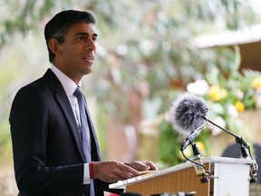 British Prime Minister Rishi Sunak speaks at the National Memorial Arboretum during a commemoration for veterans of Britain's nuclear test programme, in Alrewas, England, Monday, Nov. 21, 2022. Nuclear test veterans and their families are hopeful that the government will announce a medal recognising their service.