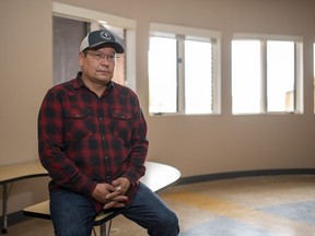 Chief Wally Burns stands for a photograph in a class room at the school on James Smith Cree Nation on September 20, 2022. The chief of a First Nation where there was a mass stabbing says some people are still sleeping with their guns as Indigenous leaders in Saskatchewan gathered to call for immediate resources to address safety in the north.