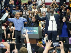 Former President Barack Obama, second from left, campaigns for Michigan Gov. Gretchen Whitmer, left, Secretary of State Jocelyn Benson, Lt. Gov. Garlin Gilchrist II, and Attorney General Dana Nessel, right, during a rally, Saturday, Oct. 29, 2022, in Detroit.