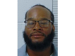 This photo provided by the Missouri Department of Corrections shows Kevin Johnson. The Missouri man sentenced to death for killing a police officer in a fit of rage over his brother's death is asking the U.S. Supreme Court to halt the execution planned for later this month, in part because the man was a teenager at the time of the killing. (Missouri Department of Corrections via AP)