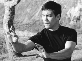 Bruce Lee Kung Fu pose California beach late 1960's.