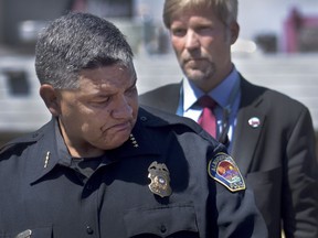 FILE - Albuquerque Police Department Police Chief Harold Medina reacts as he relays details of a shootout that left multiple officers injured in northeast Albuquerque, N.M., Thursday, Aug. 19, 2021. Medina says there has been a record number of shootings by police officers in 2022 and in most cases the person who was shot by officers was armed with a gun or knife.