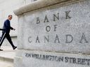 Governor of the Bank of Canada Tiff Macklem walks outside the Bank of Canada building in Ottawa.