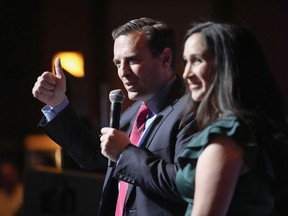 Nevada Republican Senate candidate Adam Laxalt stands with his wife Jaime Laxalt as he speaks to supporters during an election night campaign event Tuesday, Nov. 8, 2022, in Las Vegas.