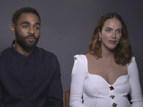 Anthony Welsh and Jessica Brown Findlay, are interviewed on Oct. 20, 2022 in London. "The Flatshare" stars Jessica Brown Findlay and Anthony Welsh got to do all their own stunts in their new rom-com TV series. (AP Photo)