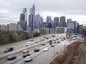 FILE - Traffic moves along the Interstate 76 highway on March 31, 2021, in Philadelphia. Two new U.S. studies released Tuesday, Nov. 15, 2022, show that automatic emergency braking can cut the number of rear-end automobile crashes in half, and reduce pickup truck crashes by more than 40%.