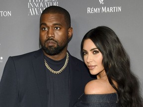 FILE - Kanye West, left, and Kim Kardashian attend the WSJ. Magazine Innovator Awards on Nov. 6, 2019, in New York. Kardashian and Ye, who legally changed his name from Kanye West, have reached a settlement in their divorce, averting a trial that had been set for next month, court documents filed Tuesday, Nov. 29, 2022, showed.