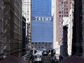 FILE - The Trump International Hotel and Tower is seen looking north on Wabash Ave. in Chicago's famed Loop, on Sept. 17, 2014. A Manhattan judge said Thursday, Nov. 3, 2022, that he will appoint an independent monitor for former President Donald Trump's real estate empire, restricting his company's ability to freely make deals, sell assets and change its corporate structure.