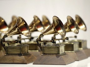 FILE - Various Grammy Awards are displayed at the Grammy Museum Experience at Prudential Center in Newark, N.J, on Oct. 10, 2017. The 2023 Grammy Awards will air live Sunday, Feb. 5.